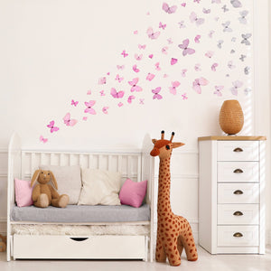 Pink to grey ombre butterfly wall decals, nursery above cot